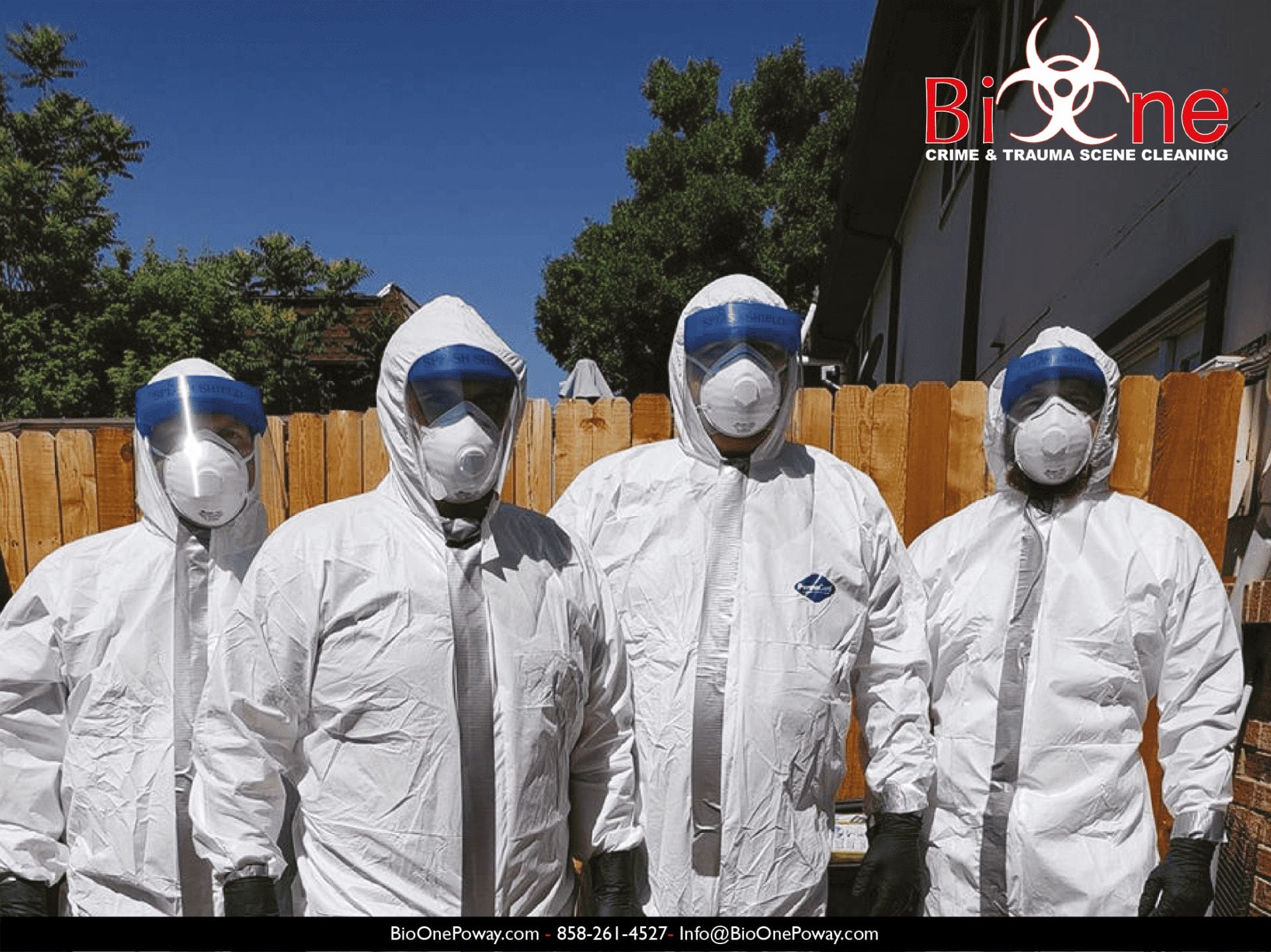Image shows Bio-One technicians dressed in hazmat and PPE.