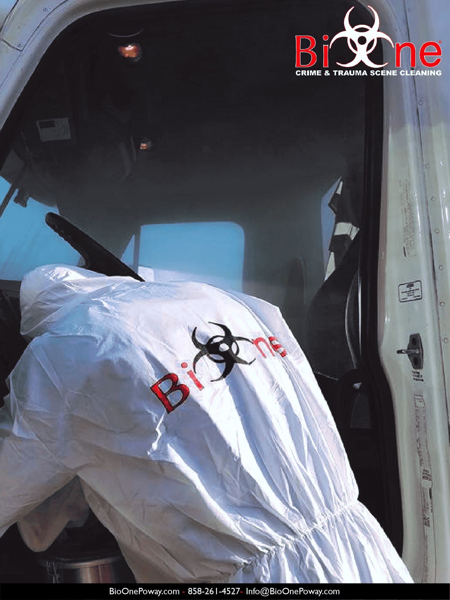 Image shows Bio-One technician disinfecting an emergency vehicle (ambulance).